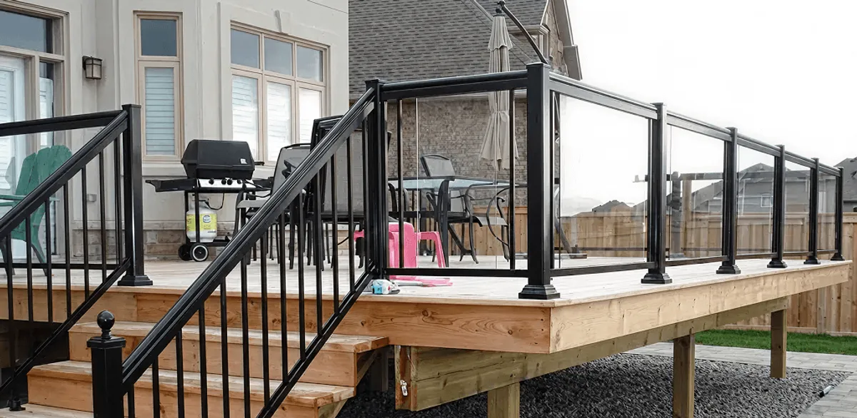 Handrail installation on a deck staircase for safety and code compliance in Long Beach, CA